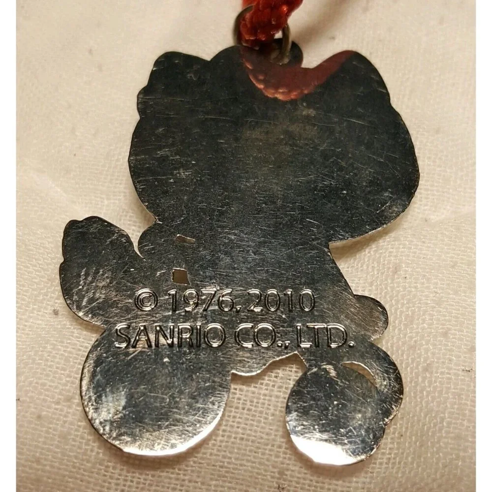 2010 Sanrio Hello Kitty Old School Bike Trike Necklace on Red Cord Appx 2